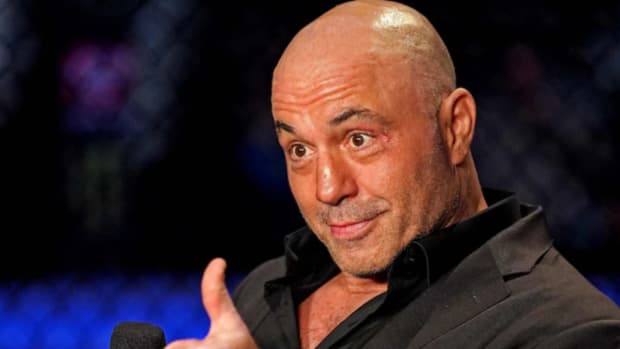 UFC color commentator Joe Rogan gives the thumbs up to UFC staff.